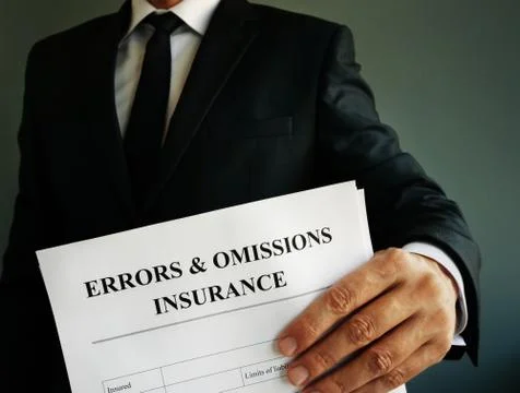 Errors and omissions E&amp;O insurance or professional liability policy in the ha 写真素材