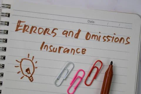 Errors and Ommisions Insurance write on a book isolated wooden table. Stock Photos