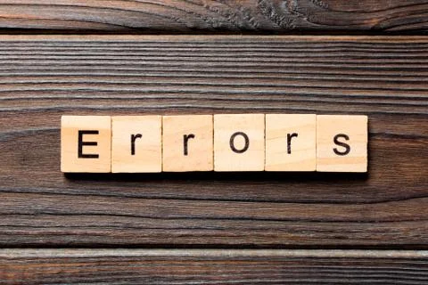Errors word written on wood block. Errors text on wooden table for your desin 写真素材