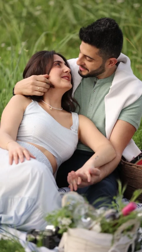 Ertical Slow Motion of Couple Hugging at a Picnic Stock Footage 288855463