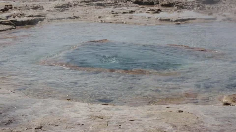 Erupting geyser explodes then drains back into hole in Earth Stock Footage 57171018