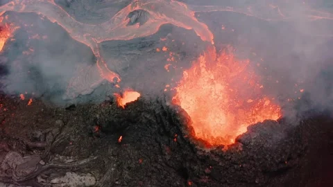 Erupting Volcano in Iceland with lava flow drone 4k (Fagradalsfjall) Stock Footage 159511904