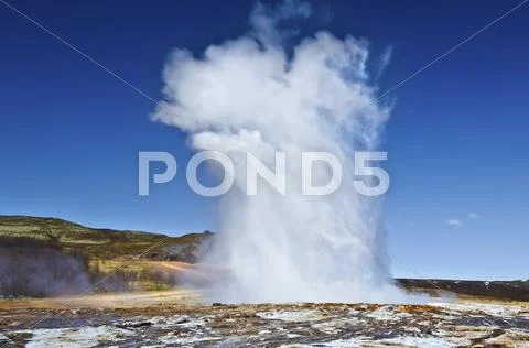 Eruption of Strokkur Geyser in Iceland Stock Photos