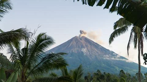 Eruption of Volcano Semeru on the island of Java. The volcano emits ash and Stock Photos