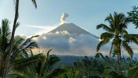 Eruption of Volcano Semeru on the island of Java. The volcano emits ash and Stock Photos