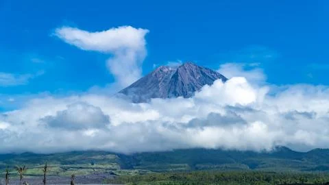 Eruption of Volcano Semeru on the island of Java. The volcano emits ash and Stock Photos