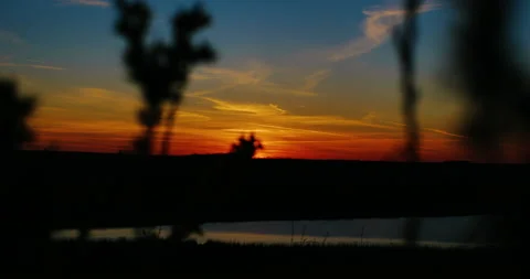 Ery beautiful sunset, the sun is setting over the horizon. Stock Footage 153880168