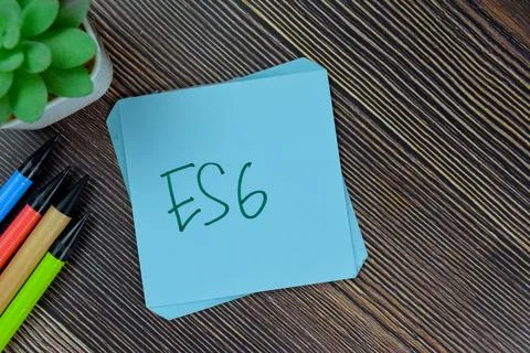 ES6 write on sticky notes isolated on Wooden Table. 스톡 사진