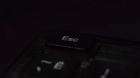 Esc button macro shooting the blinking led light on the keypad Stock Footage 130211106