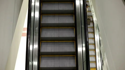 Escalator at airport top down view Stockbeeldmateriaal 1138882