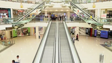 Escalator and peoples movement inside the Mall in Dubai Stock Footage 253485977