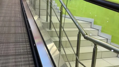 Escalator and stairs in the store Stock Footage 302927180
