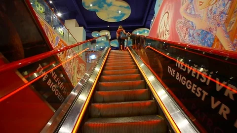 Escalator in a children's store Stock Footage 123609444