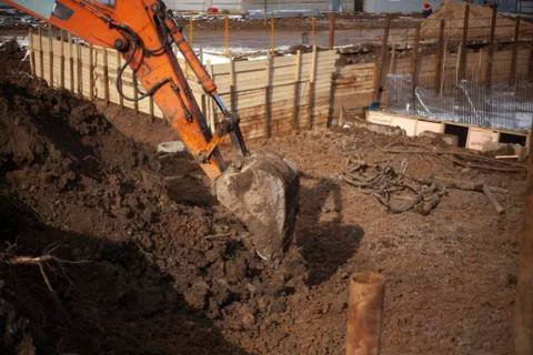 An escalator digs the ground. Stock Photos