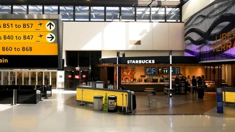 Escalator Down Starbucks Empty Newark Airport COVID-19 Pandemic Stock Footage 128337772