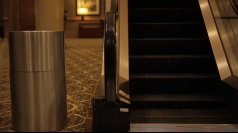Escalator going down inside Building Stock Footage 102404363