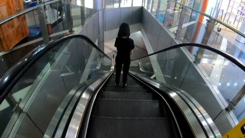 Escalator Going down With one person Video stock 104444400