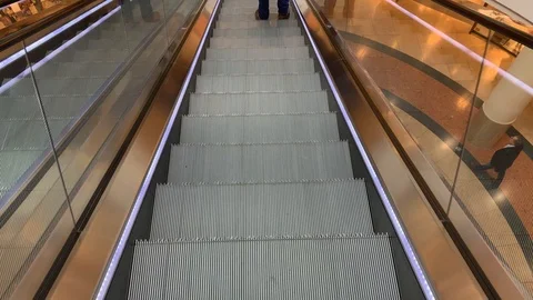 Escalator going down in a shopping mall Stock Footage 108488983