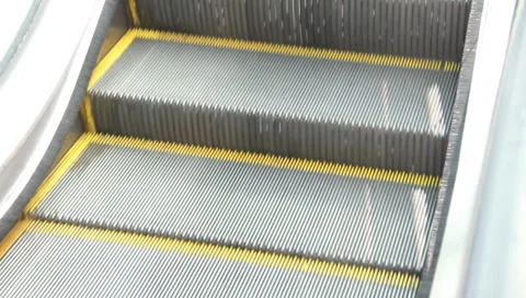 Escalator going down watch your step Stock Footage 6731689