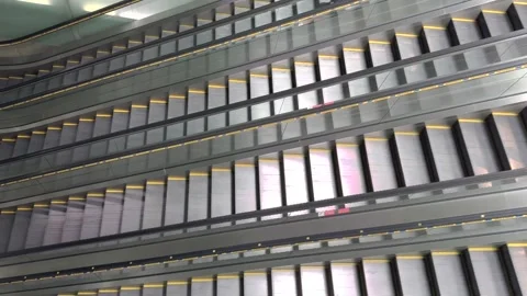 Escalator Going Up. Escalators operating in empty airport terminal Stock Footage 304088488