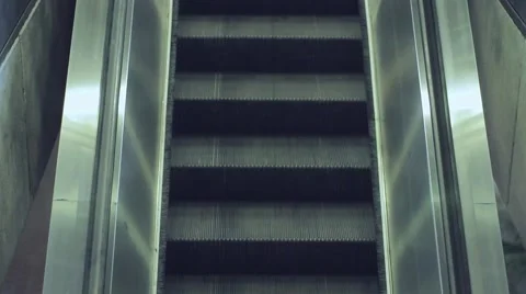 Escalator going up with ony one person in the shot Stock Footage 54593421