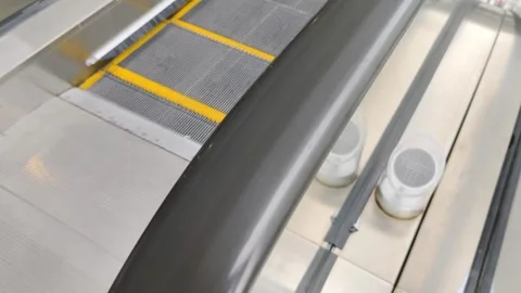 Escalator handrail that moves with the flow of the escalator stairs Stock Footage 304050773