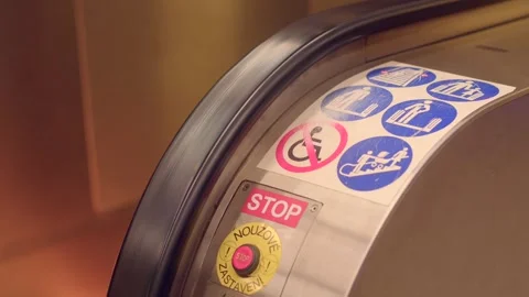 Escalator handrail with stop button and safety stickers Видео 347203647