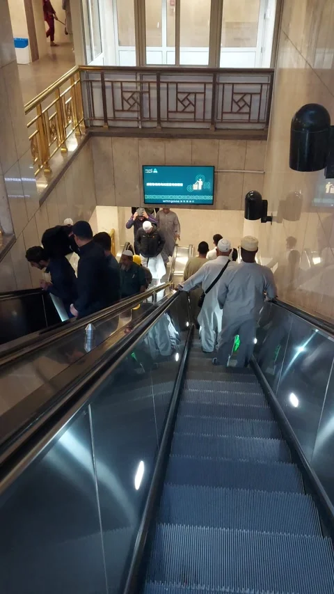 Escalator in the inside of the Nabawi Mosque to the Rooftop Stock Footage 309913449