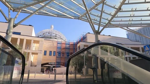 On the escalator looking towards the dome of San Raffaele hospital Vidéo 242390555
