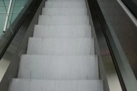 Escalator in modern building Stock Photos