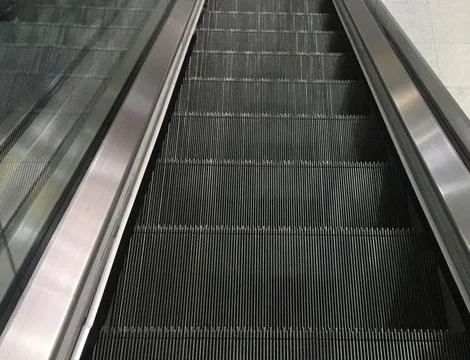 Escalator in motion Background Stock Image Stock Photos