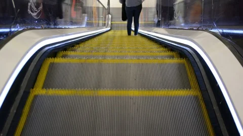 Escalator in motion, close up point of view, reversible and loopable Stock Footage 102195126