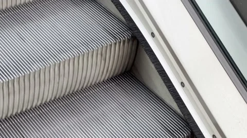 Escalator motion in the modern subway, closeup. Stock Footage 210832421