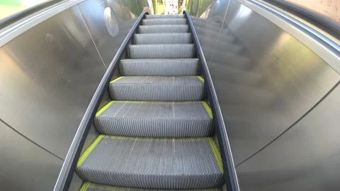 Escalator in motion in the open air Stock Footage 135505026