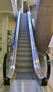 The escalator in movement Stock Photos