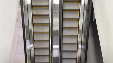 Escalator moves in different directions Stock Footage 321182636