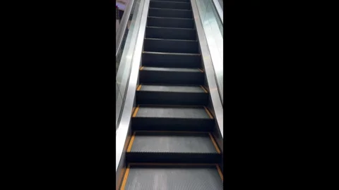 Escalator Moving Up Inside Modern Shopping Mall Interior Video stock 338040646