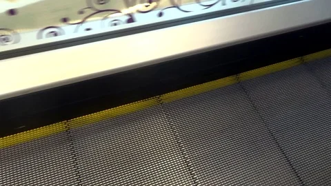 Escalator - moving staircase with glass wall Stock Footage 87587435