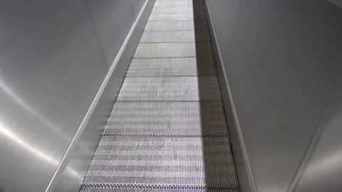 Escalator moving in the underground Stock Footage 70738475