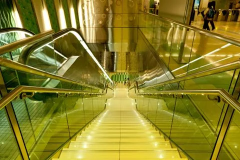 Escalator pathway. view from the top. Stock Photos
