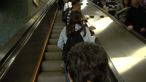 Escalator With People Going Upwards To Train Station - Smooth Moving Shot Stock Footage 90484777
