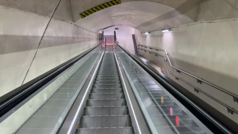 Escalator POV Ride Through Underground Metro Tunnel Stock-Footage 345130548