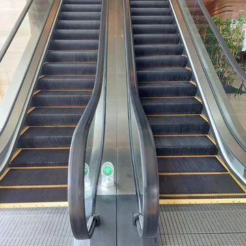 Escalator ready for visitors Stock Photos