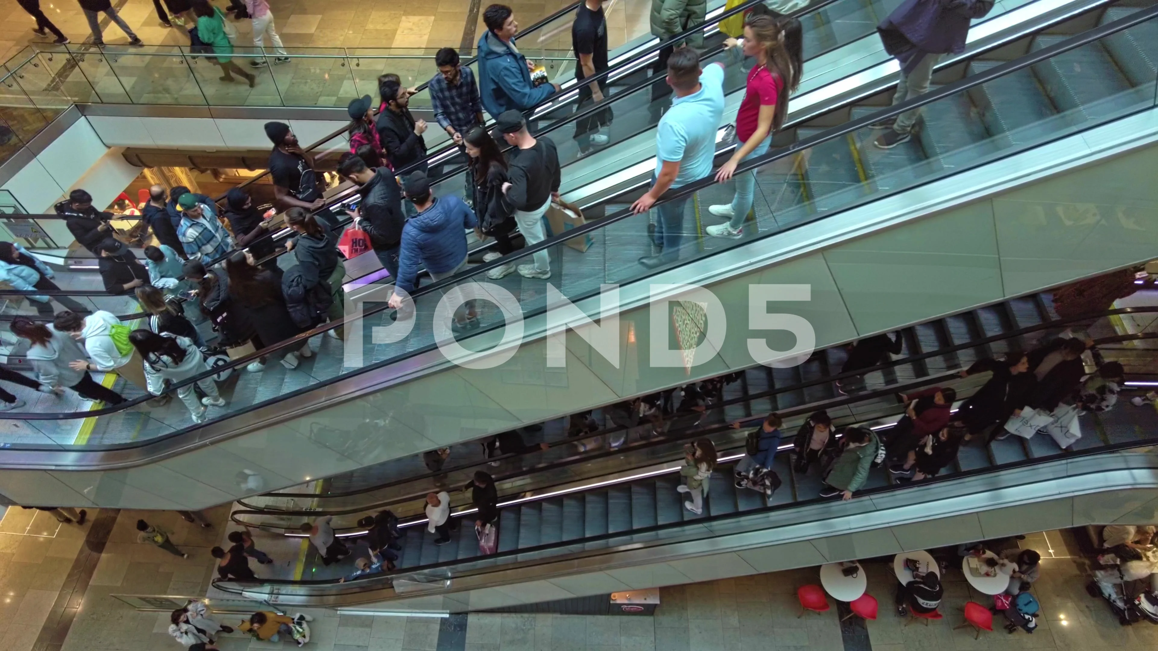 London July 2014. Westfield shopping centre. Escalator in front of