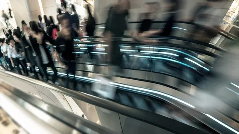 Escalator in shopping mall. Busy people crowd on escalator move fast timelapse Stock Footage