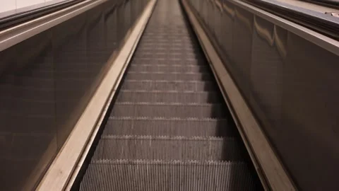 Escalator steps moving up, close up view of steps. escalator in the metro Stock Footage 263908801