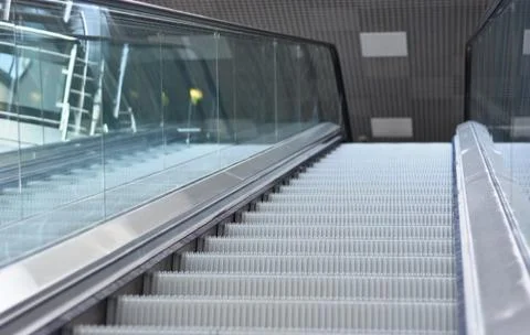 Escalator steps Stock Photos