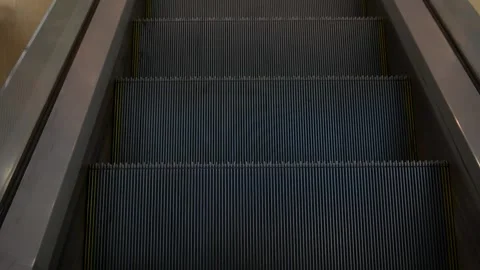 Escalator top view of the steps. Going down. Stock Footage 135838067