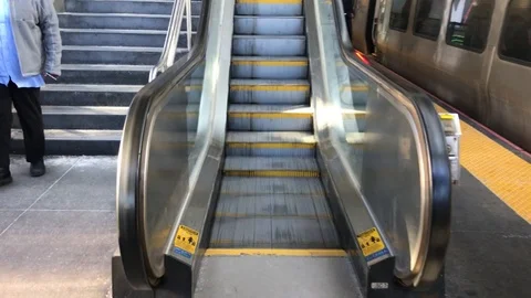 Escalator on train platform Stock Footage 122538031