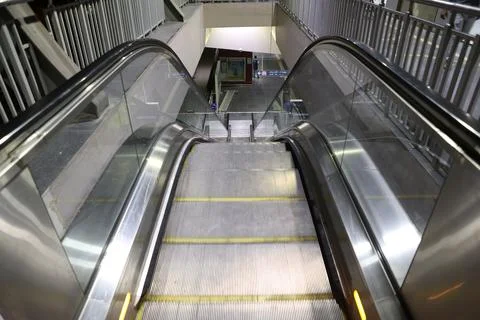 Escalators in the airport Stock Photos